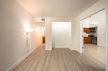 Bedroom with a white door and a lamp